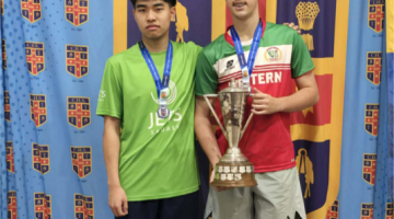 Henry pictured with Stanley Chung who he beat 3-0 in the final. The trophy Henry won was first won back in 1967, and features many names of people Henry looks up to.