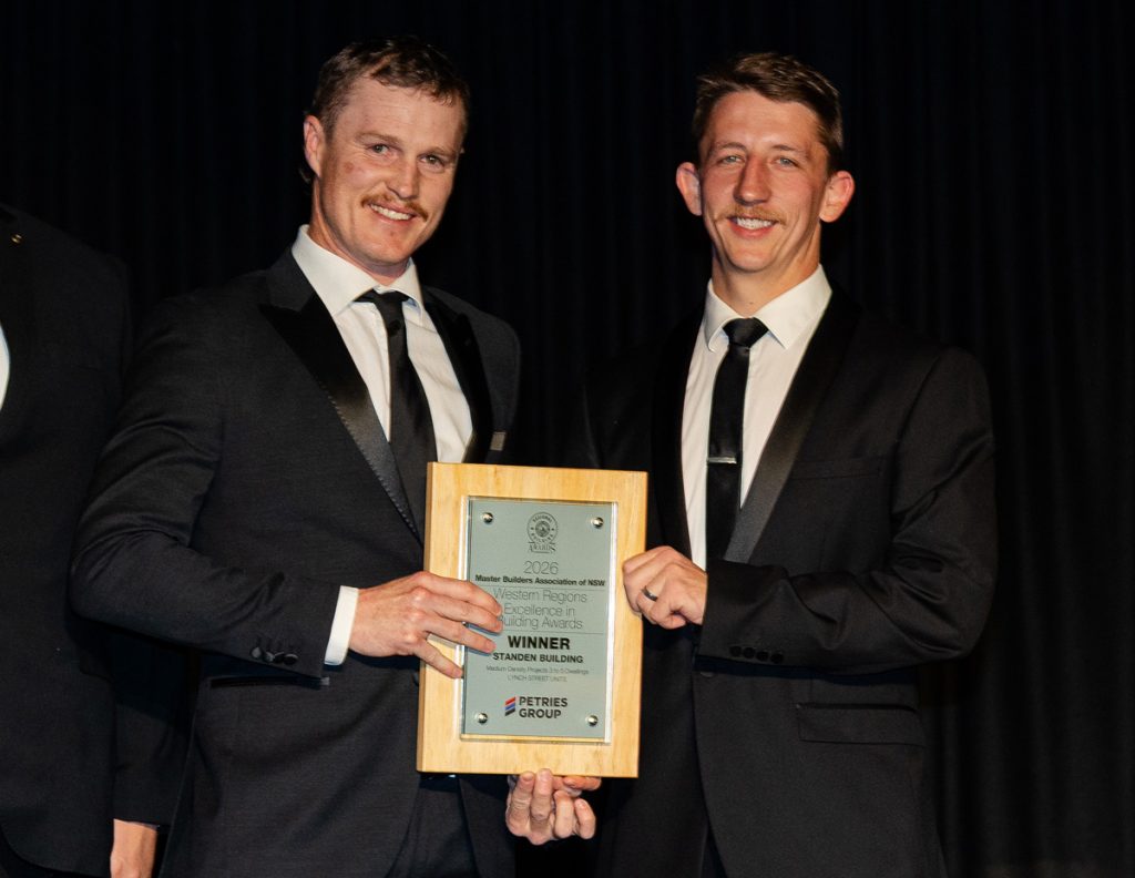Cameron Standen and Riley Thomson proudly pictured with their award