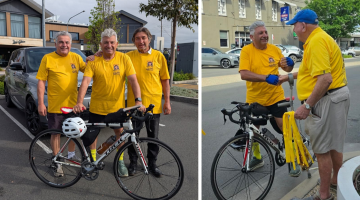 From Left to right Michael Louis and David Cherote on the road. Right: Louis arriving 4.30pm Tuesday greeted by his major sponsor J&J Robertson Transport, John Robertson.